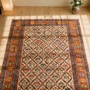 Antique Ivory Late 19th Century Tribal Caucasian Kazak Rug (SKU 19345) - styled overhead view