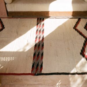 Ivory Minimalist Tribal Design Antique Native American Flatweave Navajo Rug (SKU 21706) - styled overhead view