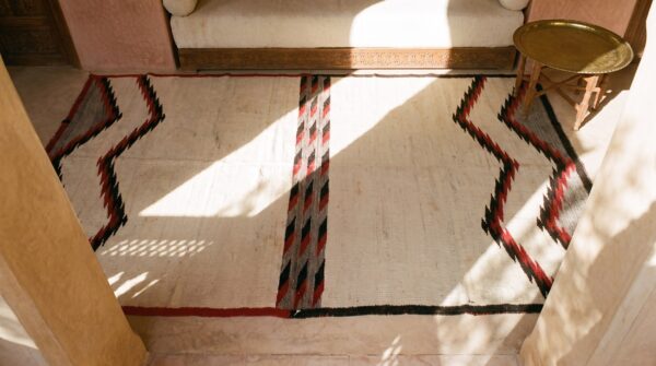 Ivory minimalist tribal design antique native american flatweave navajo rug 2 Ivory minimalist tribal design antique native american flatweave navajo rug (sku 21706) - styled overhead view