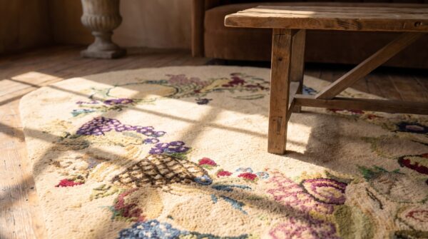 Antique ivory open field small oval american hooked folk art rug 6 Antique ivory open field small oval american hooked folk art rug (sku 20546) - in-room detail
