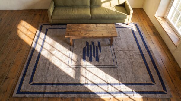 Ivory room size antique early 20th century spanish geometric art deco carpet (sku 25499) - styled overhead view