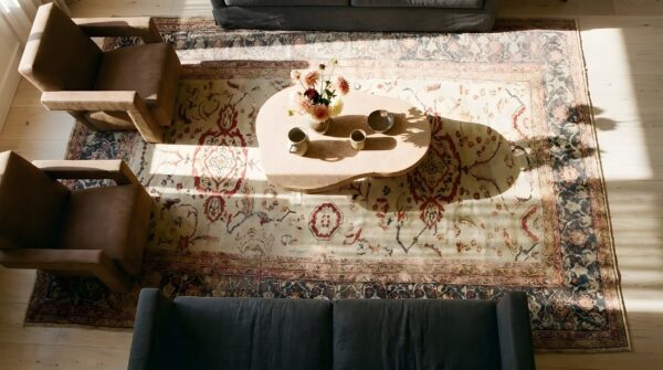 Antique ivory room size tribal allover design persian sultanabad rug 2 Antique ivory room size tribal allover design persian sultanabad rug (sku 25637) - styled overhead view