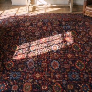 Jewel Tone Antique Tribal Persian Harshang Design Room Size Bidjar Rug (SKU 20199) - styled overhead view