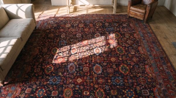 Jewel tone antique tribal persian harshang design room size bidjar rug 2 Jewel tone antique tribal persian harshang design room size bidjar rug (sku 20199) - styled overhead view