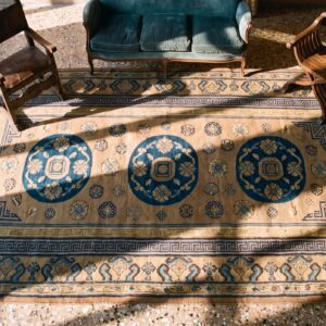 Antique Khotan Carpet 6'3"×13'5" Plum & Yellow Medallion, Circa 1870, East Turkestan (SKU 19023) - styled overhead view
