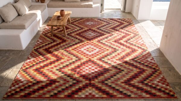 Antique kilim - oushak room size wool multicolor rug (sku 20985) - styled overhead view