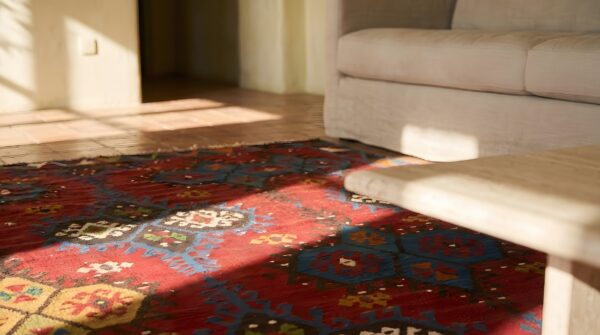Antique kilim - oushak room size wool red rug 11 Antique kilim - oushak room size wool red rug (sku 22642) - in-room detail