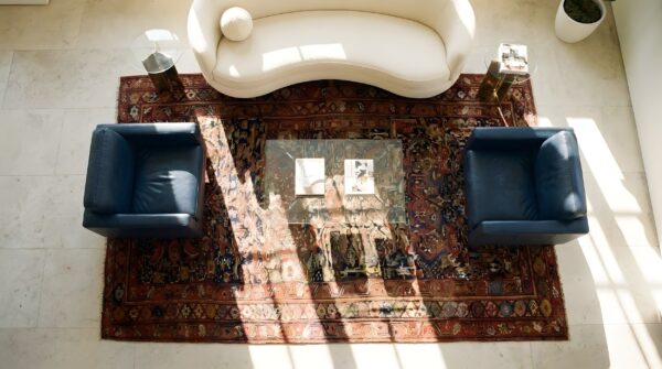 Antique kurdish carpet wool brown rug 2 Antique kurdish carpet wool brown rug (sku 22847) - styled overhead view