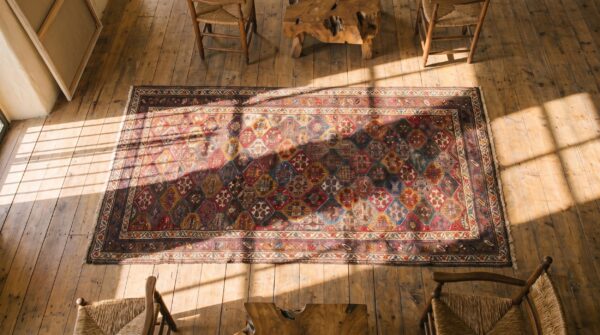 Antique kurdish long and narrow wool rug 2 Antique kurdish long and narrow wool rug (sku 18209) - styled overhead view