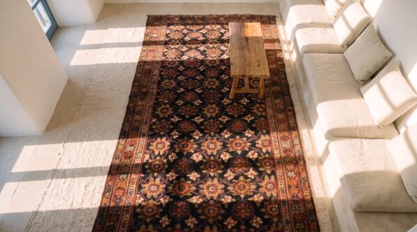 Antique kurdish persian allover floral hand knotted pile rug (sku 25302) - styled overhead view