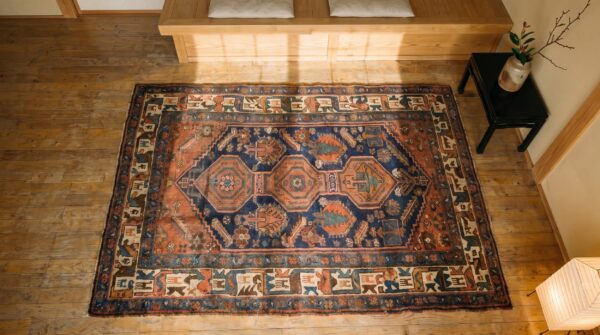 Antique kurdish small scatter size wool blue rug 2 Antique kurdish small scatter size wool blue rug (sku 19630) - styled overhead view