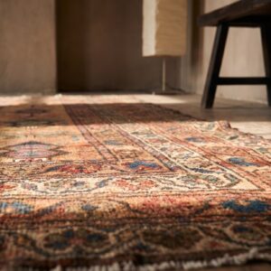 Antique Kurdish Small Scatter Size Wool Coral Rug (SKU 18133) - in-room detail