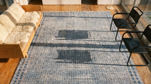 Antique large agra - cotton indian knotted rug (sku 19497) - styled overhead view