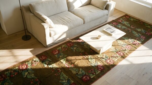 Antique large american hooked - loop pile rug (sku 25653) - styled overhead view