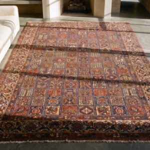 Antique Large Bakhtiari Persian Knotted Rug (SKU 18943) - styled overhead view