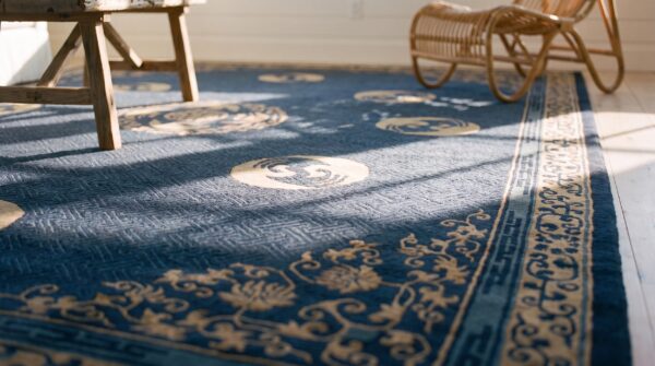 Large blue antique medallion chinese crane and bat design hand knotted peking rug 9 Large blue antique medallion chinese crane and bat design hand knotted peking rug (sku 23374) - in-room detail