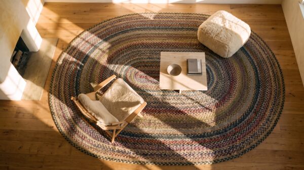 Antique large braided american allover flat weave oval rug 2 Antique large braided american allover flat weave oval rug (sku 24183) - styled overhead view