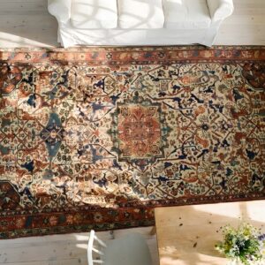 Antique Large Caucasian Medallion Knotted Rug (SKU 23781) - styled overhead view
