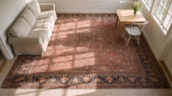 Antique large coral kashan - mohtasham persian floral knotted rug 2 Antique large coral kashan - mohtasham persian floral knotted rug (sku 23606) - styled overhead view