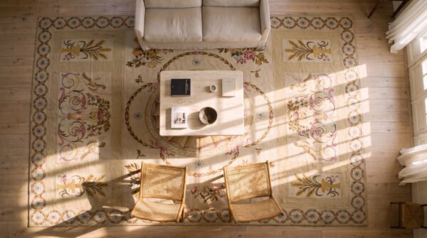 Antique large floral medallion flat weave rug 2 Antique large floral medallion flat weave rug (sku 25551) - styled overhead view