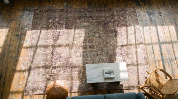 Antique large kerman - lavar persian knotted rug 2 Antique large kerman - lavar persian knotted rug (sku 17729) - styled overhead view