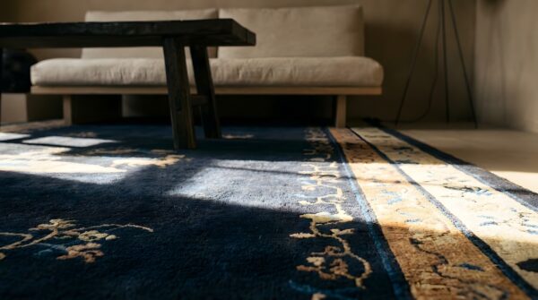 Antique large peking chinese geometric, medallion knotted rug (sku 24124) - in-room detail