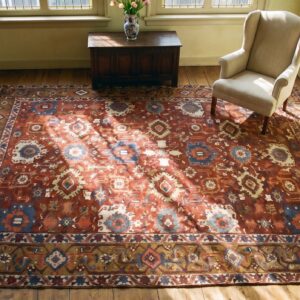 Large Red Tribal Geometric Antique Persian Heriz Serapi Room Size Rug (SKU 24078) - styled overhead view