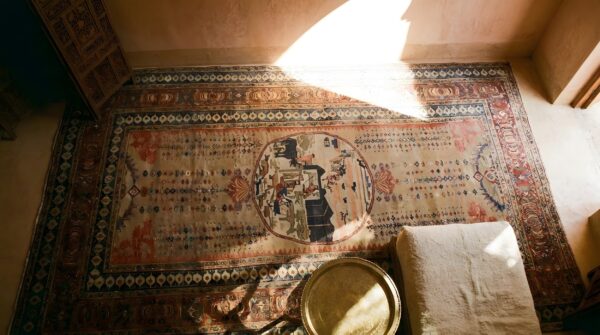 Antique large senneh persian allover knotted rug 2 Antique large senneh persian allover knotted rug (sku 23912) - styled overhead view