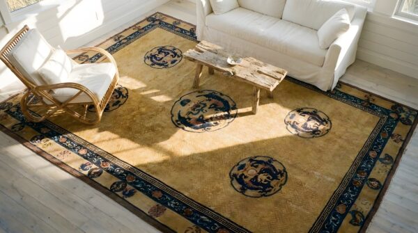 Antique large size ivory chinese allover dragon medallion design rug 2 Antique large size ivory chinese allover dragon medallion design rug (sku 25176) - styled overhead view