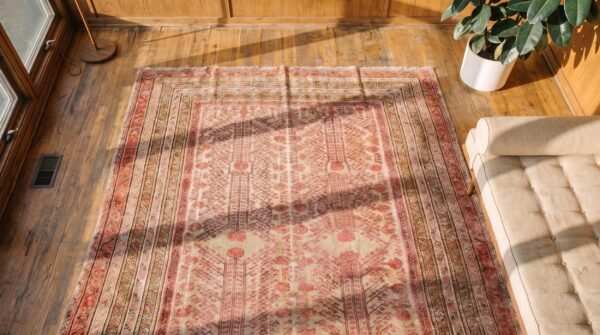 Antique large size rustic allover pomegranate design hand knotted pile east turkestan khotan rug 2 Antique large size rustic allover pomegranate design hand knotted pile east turkestan khotan rug (sku 20028) - styled overhead view