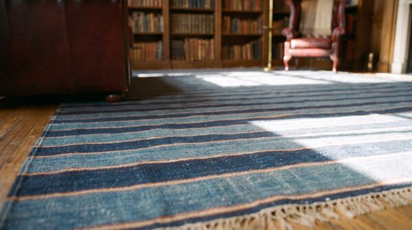 Large square flatwoven blue antique striped dhurrie rug 8 Large square flatwoven blue antique striped dhurrie rug (sku 24156) - in-room detail