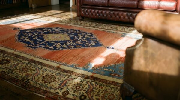 Antique large yellow bakshaish persian medallion knotted rug 11 Antique large yellow bakshaish persian medallion knotted rug (sku 23845) - in-room detail
