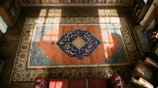 Antique large yellow bakshaish persian medallion knotted rug 2 Antique large yellow bakshaish persian medallion knotted rug (sku 23845) - styled overhead view