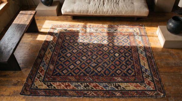 Late 19th century antique blue square tribal geometric caucasian shirvan rug (sku 18611) - styled overhead view