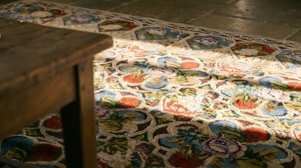 Antique late 19th century english floral needlepoint square rug (sku 25753) - in-room detail