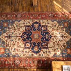 Late 19th Century Ivory Antique Persian Serapi Heriz Tribal Geometric Room Size Rug (SKU 21217) - styled overhead view