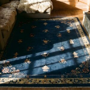 Antique Late 19th Century Navy Blue Chinese Floral Peking Rug (SKU 23497) - styled overhead view