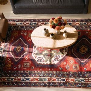 Late 19th Century Antique Tribal Geometric Medallion Caucasian Lori Pambak Coral Rug (SKU 21670) - styled overhead view