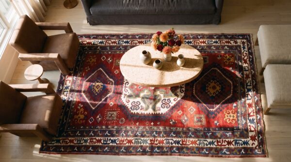 Late 19th century antique tribal geometric medallion caucasian lori pambak coral rug (sku 21670) - styled overhead view