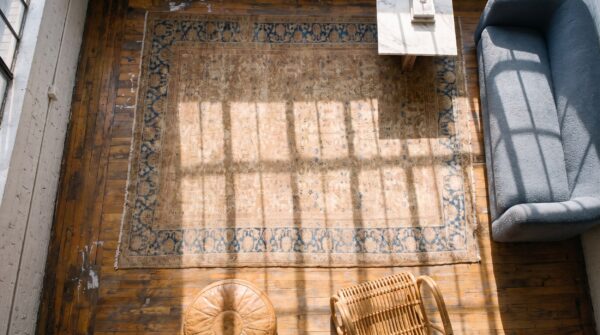 Light blue and earthy cream color antique decorative persian sultanabad rug 2 Light blue and earthy cream color antique decorative persian sultanabad rug (sku 21233) - styled overhead view