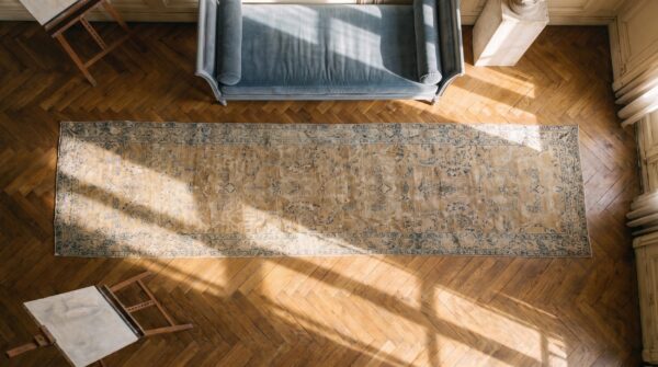 Antique light color floral persian kerman hallway runner wool rug (sku 21716) - styled overhead view
