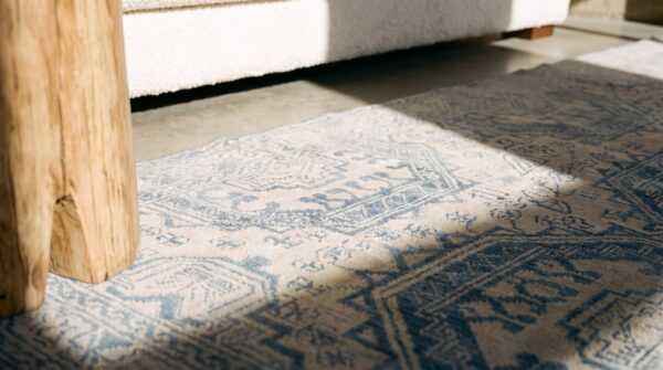 Antique light ivory color faded blue geometric design cotton agra rug from india 10 Antique light ivory color faded blue geometric design cotton agra rug from india (sku 20129) - in-room detail