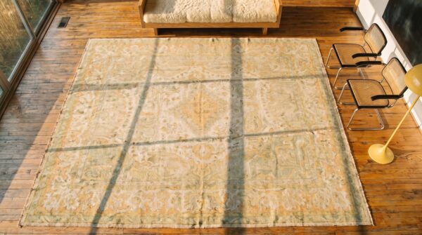 Light soft washed out ivory color antique decorative turkish borlou oushak rug 2 Light soft washed out ivory color antique decorative turkish borlou oushak rug (sku 19701) - styled overhead view