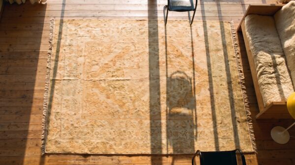 Light warm washed out color antique indian room size amritsar rug 2 Light warm washed out color antique indian room size amritsar rug (sku 20762) - styled overhead view