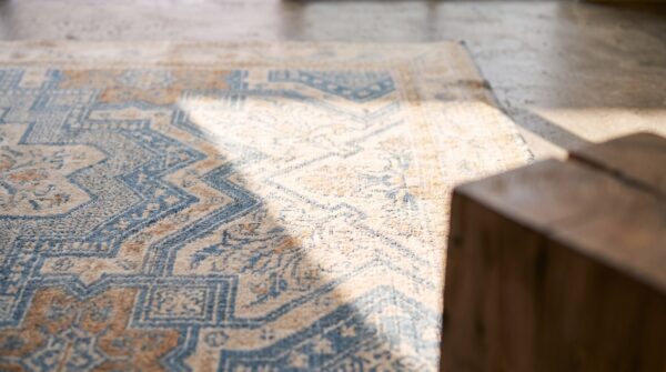 Light washed out blue color tribal geometric design antique cotton agra rug 10 Light washed out blue color tribal geometric design antique cotton agra rug (sku 19441) - in-room detail