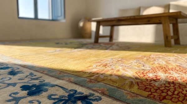 Light yellow antique artistic scenic design chinese deco rug (sku 24227) - in-room detail