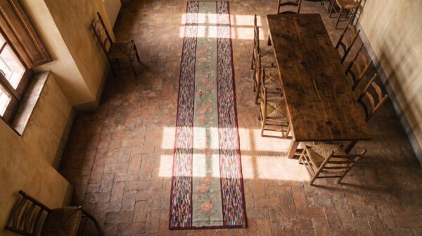 Antique long and narrow american hooked floral folk art hallway runner rug 2 Antique long and narrow american hooked floral folk art hallway runner rug (sku 17202) - styled overhead view
