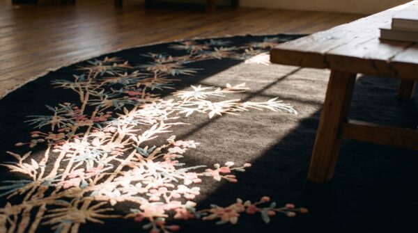 Lush wool pile antique chinese art deco black oval rug 8 Lush wool pile antique chinese art deco black oval rug (sku 23429) - in-room detail