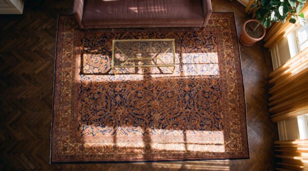 Magnificent navy blue color fine weave floral design antique persian sarouk rug 2 Magnificent navy blue color fine weave floral design antique persian sarouk rug (sku 21894) - styled overhead view