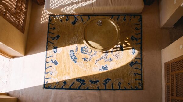 Mid 18th century antique chinese dragon ningxia square rug 2 Mid 18th century antique chinese dragon ningxia square rug (sku 23371) - styled overhead view